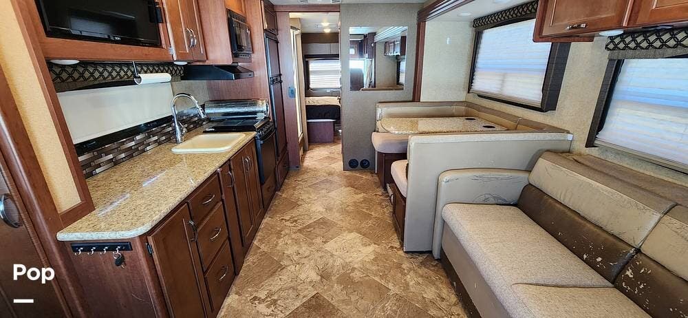 Call now about this 2016 Thor Motor Coach A.C.E. 30.1! 2016 Thor Motor Coach A.C.E. 30.1 - Used Class A For Sale by Pop RVs in Bonham, Texas features Generator, Air Conditioning, Awning, Slideout