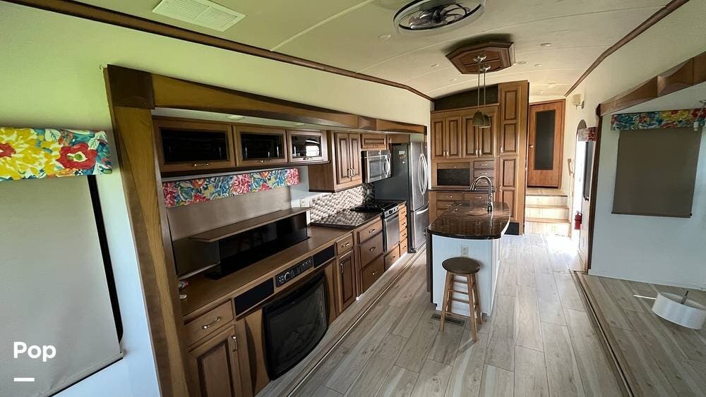 Call now about this 2015 Forest River Cedar Creek 36CKTS! 2015 Forest River Cedar Creek 36CKTS - Used Fifth Wheel For Sale by Pop RVs in Palmetto, Florida features Awning, Slideout, Leveling Jacks, Air Conditioning