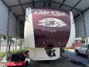 Call now about this 2017 Forest River Cedar Creek 34RL2! 2017 Forest River Cedar Creek 34RL2 - Used Fifth Wheel For Sale by Pop RVs in Concord, North Carolina features Air Conditioning, Slideout