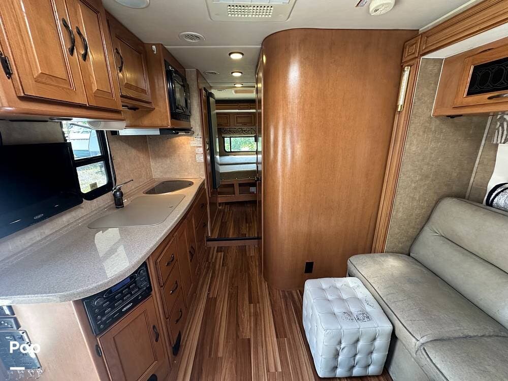 Call now about this 2013 Coachmen Prism 24G! 2013 Coachmen Prism 24G - Used Class C For Sale by Pop RVs in Pearland, Texas features Slideout, Awning, Air Conditioning, Generator