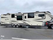 Call now about this 2021 Grand Design Solitude 390RK-R! 2021 Grand Design Solitude 390RK-R - Used Fifth Wheel For Sale by Pop RVs in Big Stone Gap, Virginia features Air Conditioning, Awning, Slideout, Leveling Jacks