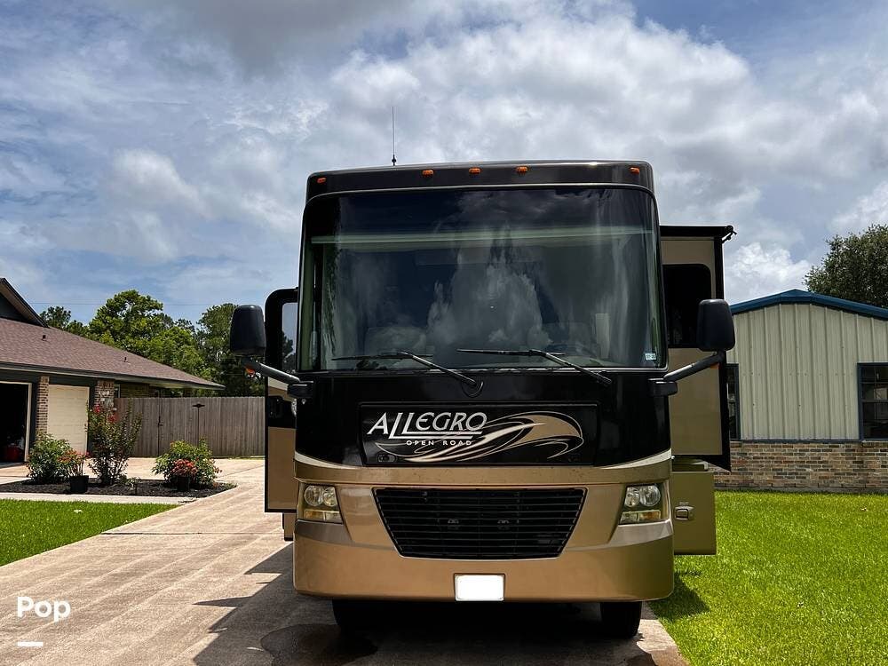 Call now about this 2011 Tiffin Allegro 35QBA! 2011 Tiffin Allegro 35QBA - Used Class A For Sale by Pop RVs in Santa Fe, Texas features Air Conditioning, Generator, Slideout, Awning, Leveling Jacks