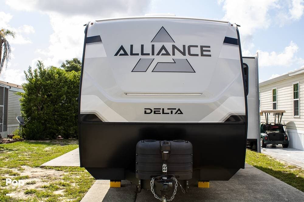 Call now about this 2024 Alliance RV Delta 262RB! 2024 Alliance RV Delta 262RB - Used Travel Trailer For Sale by Pop RVs in Davenport, Florida features Awning, Air Conditioning, Leveling Jacks, Slideout