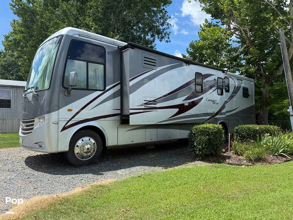 Contact us now about this 2011 Newmar Canyon Star 3856! 2011 Canyon Star 3856 by Newmar from Pop RVs in Texarkana, Texas