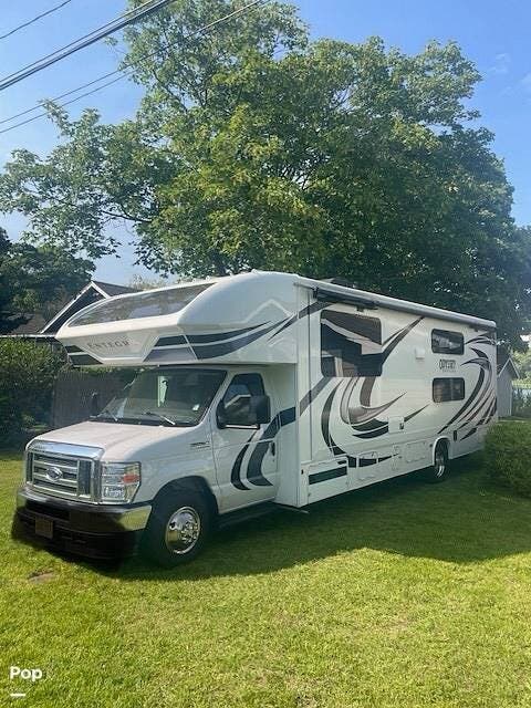Call now about this 2021 Entegra Coach Odyssey 31F! 2021 Entegra Coach Odyssey 31F - Used Class C For Sale by Pop RVs in East Marion, New York features Leveling Jacks, Awning, Air Conditioning, Slideout, Generator