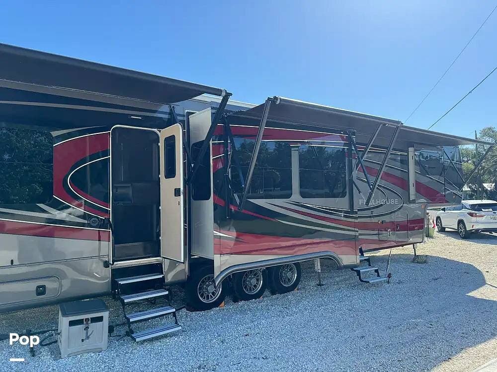 Call now about this 2022 DRV Full House LX455! 2022 DRV Full House LX455 - Used Toy Hauler For Sale by Pop RVs in Sarasota, Florida features Awning, Slideout, Generator, Leveling Jacks, Air Conditioning