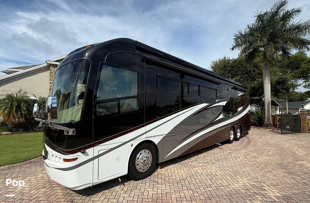 Call now about this 2014 Entegra Coach Anthem 42DLQ! 2014 Entegra Coach Anthem 42DLQ - Used Diesel Pusher For Sale by Pop RVs in Belle Isle, Florida features Awning, Slideout, Air Conditioning, Leveling Jacks, Generator