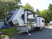 Call now about this 2022 Grand Design Momentum 395MS-R! 2022 Grand Design Momentum 395MS-R - Used Toy Hauler For Sale by Pop RVs in Merrimack, New Hampshire features Air Conditioning, Slideout, Awning, Leveling Jacks