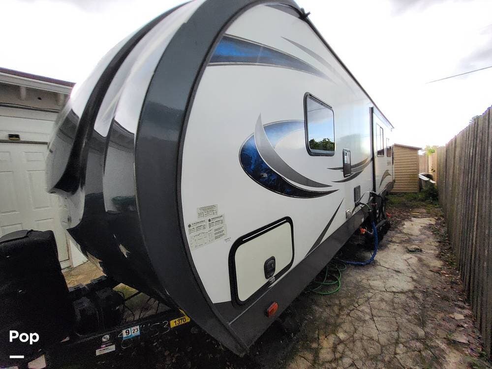 Call now about this 2019 Forest River Salem Hemisphere GLX 273RL! 2019 Forest River Salem Hemisphere GLX 273RL - Used Travel Trailer For Sale by Pop RVs in Orlando, Florida features Air Conditioning, Awning, Slideout