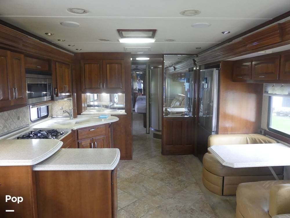 Call now about this 2008 Monaco RV Camelot 42PDQ! 2008 Monaco RV Camelot 42PDQ - Used Diesel Pusher For Sale by Pop RVs in Melbourne, Florida features Air Conditioning, Generator, Slideout, Leveling Jacks, Awning