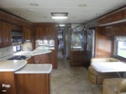 Call now about this 2008 Monaco RV Camelot 42PDQ! 2008 Monaco RV Camelot 42PDQ - Used Diesel Pusher For Sale by Pop RVs in Melbourne, Florida features Air Conditioning, Generator, Slideout, Leveling Jacks, Awning
