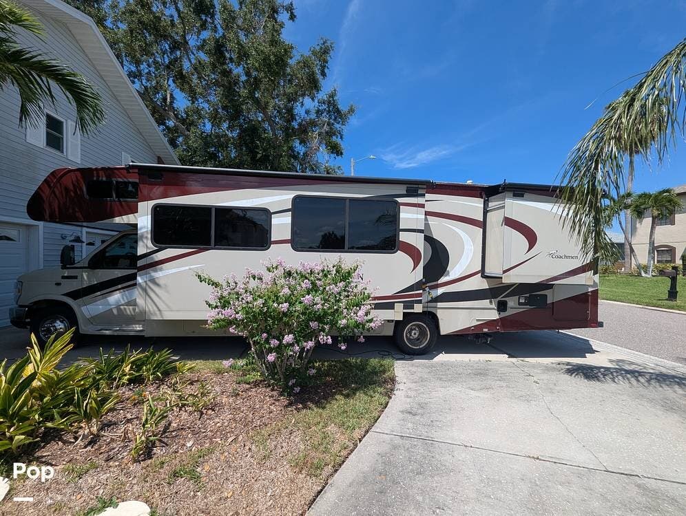 Call now about this 2020 Coachmen Leprechaun 319MB! 2020 Coachmen Leprechaun 319MB - Used Class C For Sale by Pop RVs in Apollo Beach, Florida features Leveling Jacks, Awning, Slideout, Air Conditioning, Generator