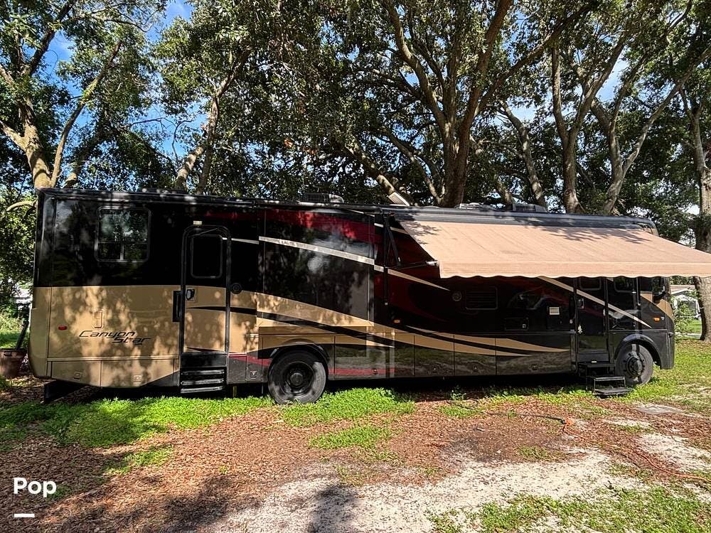 Contact us now about this 2010 Newmar Canyon Star 3920! 2010 Canyon Star 3920 by Newmar from Pop RVs in Clermont, Florida