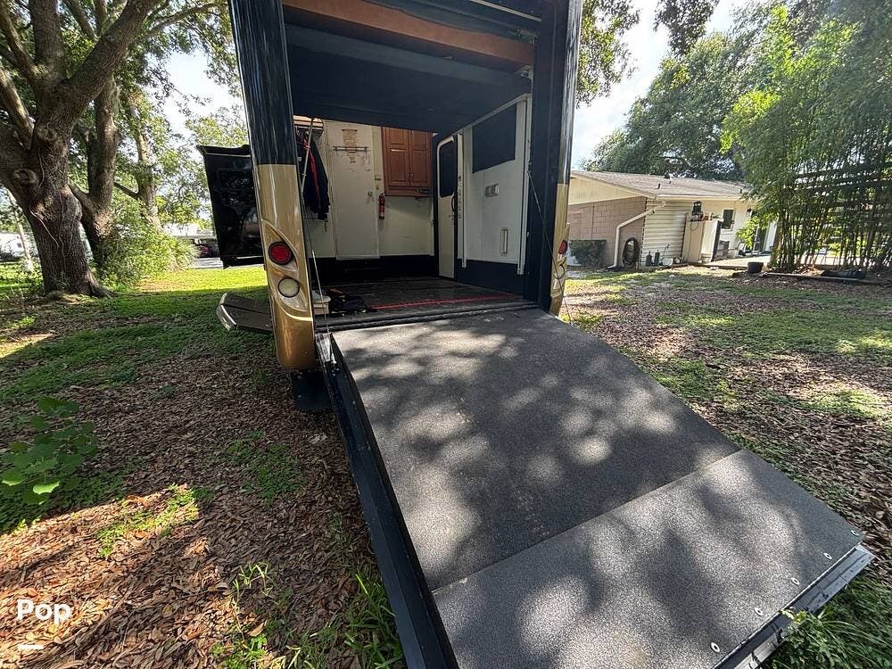 Call now about this 2010 Newmar Canyon Star 3920! 2010 Newmar Canyon Star 3920 - Used Toy Hauler For Sale by Pop RVs in Clermont, Florida features Awning, Slideout, Leveling Jacks, Air Conditioning, Generator