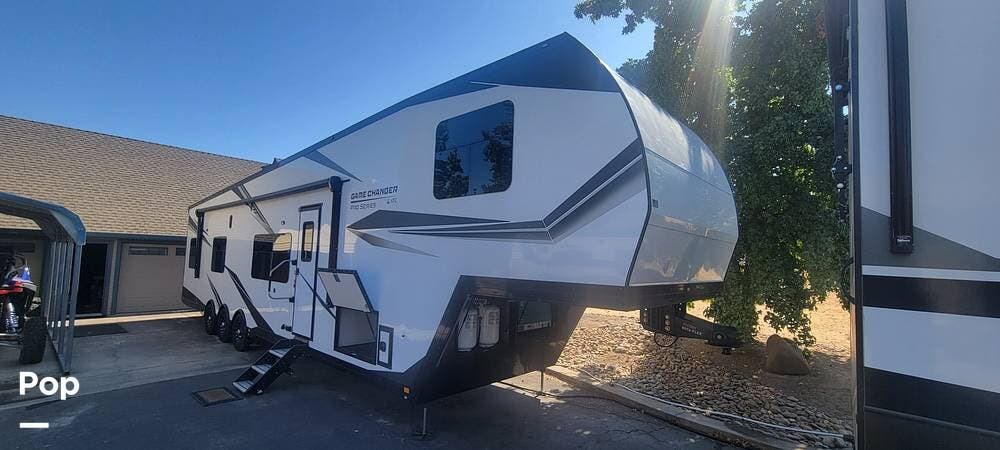 Call now about this 2023 ATC Game Changer RV 4528! 2023 ATC Game Changer RV 4528 - Used Toy Hauler For Sale by Pop RVs in Valley Springs, California features Leveling Jacks, Slideout, Generator, Awning, Air Conditioning