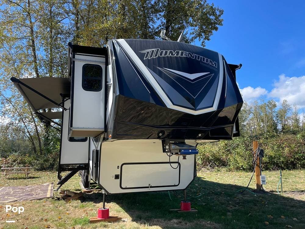 Call now about this 2023 Grand Design Momentum 376THS! 2023 Grand Design Momentum 376THS - Used Toy Hauler For Sale by Pop RVs in Kelso, Washington features Slideout, Air Conditioning, Generator, Leveling Jacks, Awning