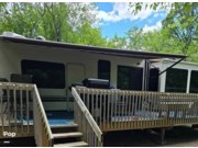 Call now about this 2018 Forest River Cedar Creek 40CFE2! 2018 Forest River Cedar Creek 40CFE2 - Used Travel Trailer For Sale by Pop RVs in Delavan, Wisconsin features Air Conditioning, Awning, Slideout
