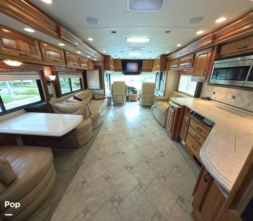 Call now about this 2009 Monaco RV Camelot 42DSQ! 2009 Monaco RV Camelot 42DSQ - Used Diesel Pusher For Sale by Pop RVs in Spicewood, Texas features Generator, Air Conditioning, Awning, Slideout, Leveling Jacks