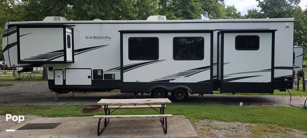 Call now about this 2022 Forest River Cardinal Limited 383BHLE! 2022 Forest River Cardinal Limited 383BHLE - Used Fifth Wheel For Sale by Pop RVs in Sevierville, Tennessee features Air Conditioning, Leveling Jacks, Slideout, Awning