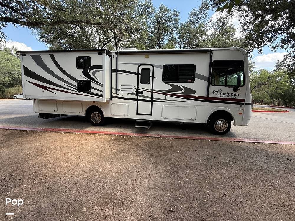 Call now about this 2012 Coachmen Mirada 32BH! 2012 Coachmen Mirada 32BH - Used Class A For Sale by Pop RVs in San Antonio, Texas features Air Conditioning, Awning, Leveling Jacks, Slideout, Generator