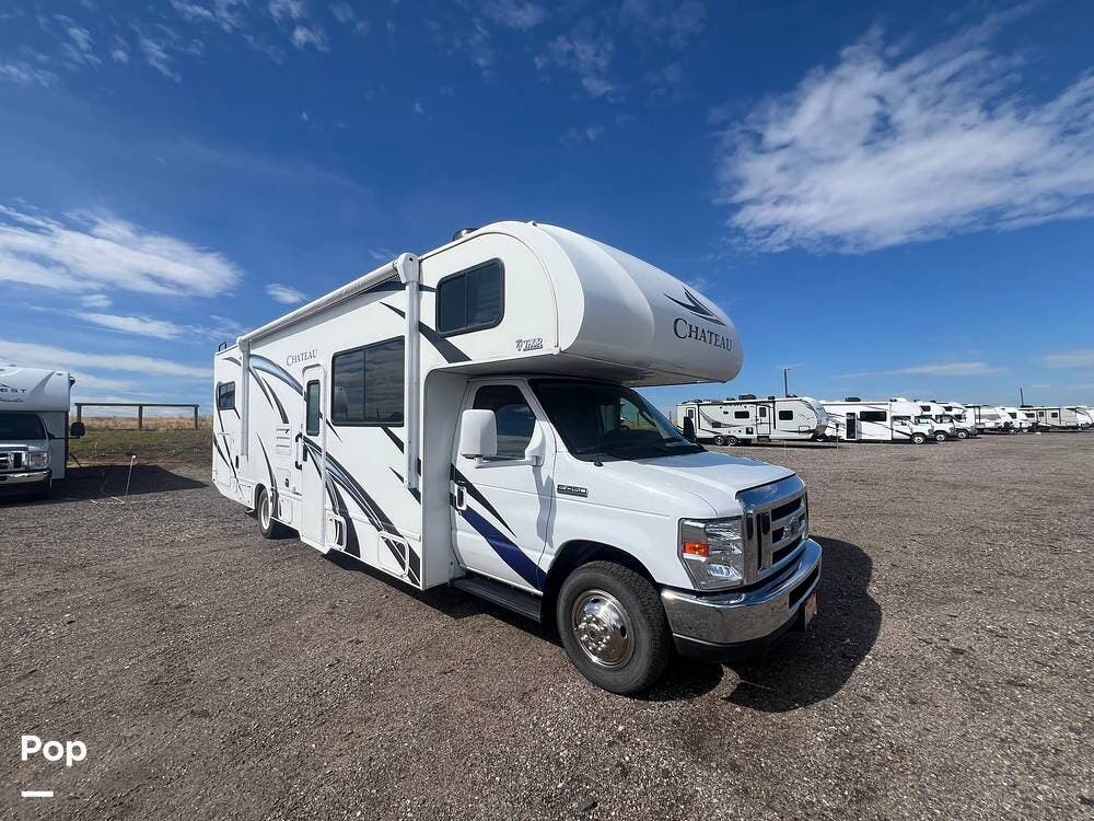 Call now about this 2020 Thor Motor Coach Chateau 31EV! 2020 Thor Motor Coach Chateau 31EV - Used Class C For Sale by Pop RVs in Aurora, Colorado features Generator, Slideout, Air Conditioning, Awning