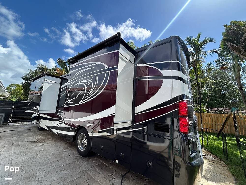 Call now about this 2021 Coachmen Sportscoach 354QS! 2021 Coachmen Sportscoach 354QS - Used Diesel Pusher For Sale by Pop RVs in Hollywood, Florida features Air Conditioning, Awning, Generator, Slideout, Leveling Jacks