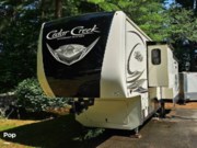 Call now about this 2020 Forest River Cedar Creek 38FBD! 2020 Forest River Cedar Creek 38FBD - Used Fifth Wheel For Sale by Pop RVs in Granby, Connecticut features Leveling Jacks, Slideout, Awning, Air Conditioning