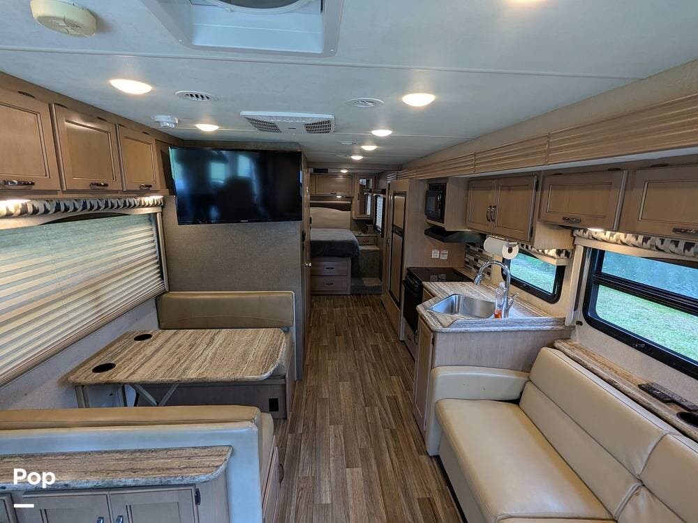 Call now about this 2018 Thor Motor Coach A.C.E. 30.4! 2018 Thor Motor Coach A.C.E. 30.4 - Used Class A For Sale by Pop RVs in Pierson, Florida features Air Conditioning, Generator, Slideout, Awning