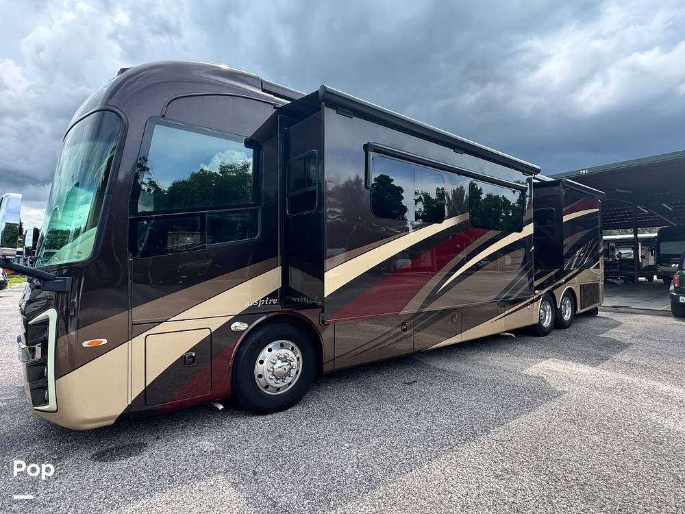 Call now about this 2017 Entegra Coach Aspire 42RBQ! 2017 Entegra Coach Aspire 42RBQ - Used Diesel Pusher For Sale by Pop RVs in Thonotosassa, Florida features Generator, Awning, Air Conditioning, Slideout, Leveling Jacks