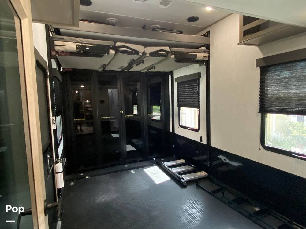 Contact us now about this 2023 Grand Design Momentum 397TH! 2023 Momentum 397TH by Grand Design from Pop RVs in Port Saint Lucie, Florida