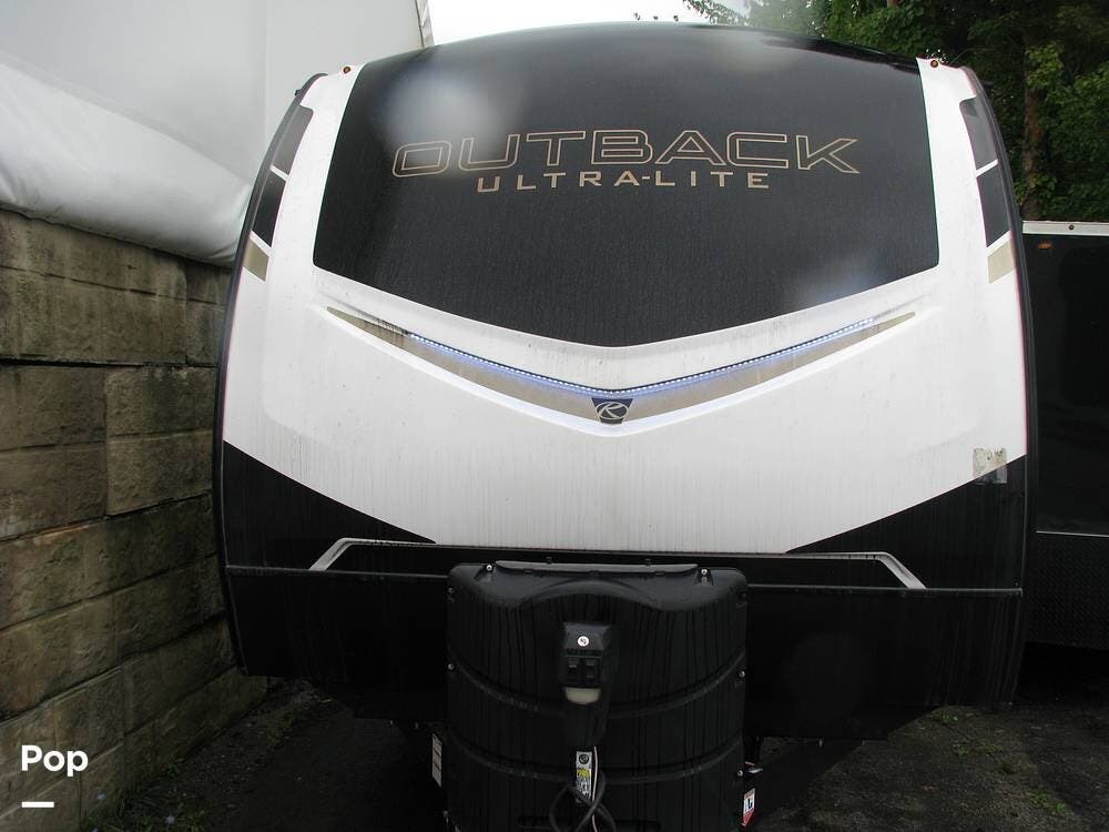 Call now about this 2022 Keystone Outback 292URL! 2022 Keystone Outback 292URL - Used Travel Trailer For Sale by Pop RVs in Strongsville, Ohio features Slideout, Air Conditioning, Awning, Leveling Jacks