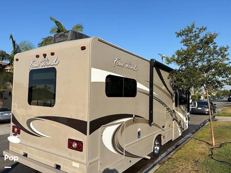 Contact us now about this 2016 Thor Motor Coach Four Winds 31E! 2016 Four Winds 31E by Thor Motor Coach from Pop RVs in Beaumont, California