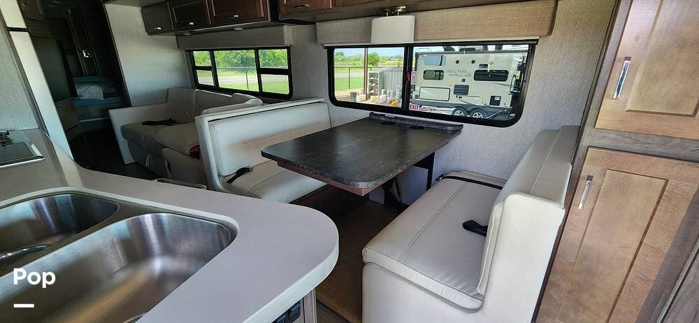 Call now about this 2021 Winnebago Adventurer 35F! 2021 Winnebago Adventurer 35F - Used Class A For Sale by Pop RVs in Nocona, Texas features Air Conditioning, Awning, Generator, Leveling Jacks, Slideout