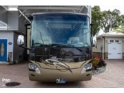 Call now about this 2012 Tiffin Allegro Breeze 32BR! 2012 Tiffin Allegro Breeze 32BR - Used Diesel Pusher For Sale by Pop RVs in Davenport, Florida features Leveling Jacks, Slideout, Air Conditioning, Awning, Generator