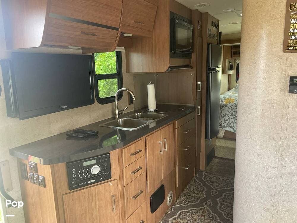 Call now about this 2014 Itasca Navion iQ 24G! 2014 Itasca Navion iQ 24G - Used Class C For Sale by Pop RVs in Woodland, California features Awning, Slideout, Generator, Air Conditioning