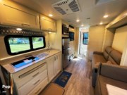 Call now about this 2022 Tiffin Wayfarer 25RW! 2022 Tiffin Wayfarer 25RW - Used Class C For Sale by Pop RVs in Jasper, Indiana features Awning, Generator, Leveling Jacks, Air Conditioning, Slideout