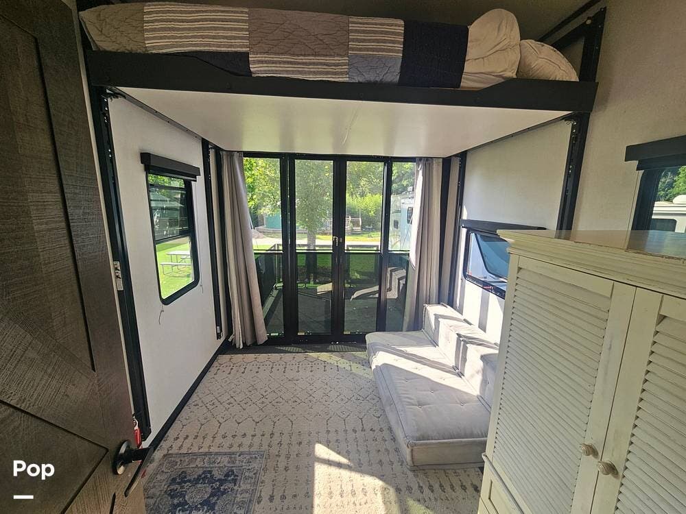Call now about this 2021 Forest River XLR Nitro 407! 2021 Forest River XLR Nitro 407 - Used Toy Hauler For Sale by Pop RVs in Hampton Bays, New York features Air Conditioning, Slideout, Generator, Awning, Leveling Jacks