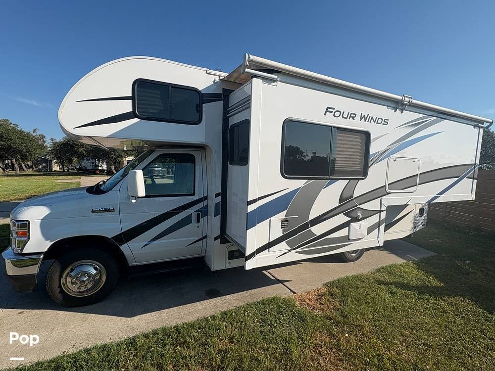 Call now about this 2023 Thor Motor Coach Four Winds 24F! 2023 Thor Motor Coach Four Winds 24F - Used Class C For Sale by Pop RVs in Rockport, Texas features Awning, Air Conditioning, Leveling Jacks, Generator, Slideout