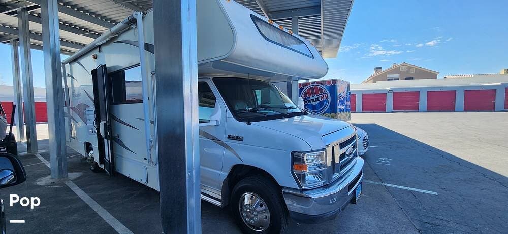 Call now about this 2011 Coachmen Freelander 26QB! 2011 Coachmen Freelander 26QB - Used Class C For Sale by Pop RVs in Las Vegas, Nevada features Air Conditioning, Awning, Generator, Slideout
