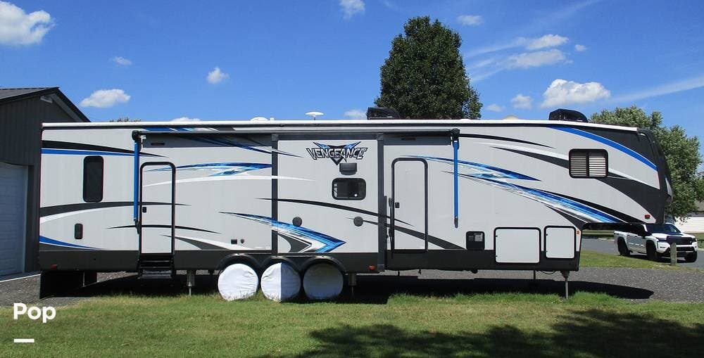Call now about this 2018 Forest River Vengeance 377V! 2018 Forest River Vengeance 377V - Used Toy Hauler For Sale by Pop RVs in Salisbury, Maryland features Air Conditioning, Generator, Slideout, Awning, Leveling Jacks