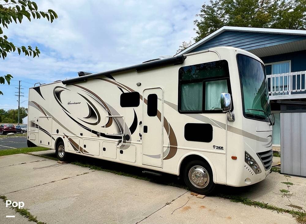 Call now about this 2017 Thor Motor Coach Hurricane 34F! 2017 Thor Motor Coach Hurricane 34F - Used Class A For Sale by Pop RVs in Huntley, Illinois features Awning, Slideout, Generator, Leveling Jacks, Air Conditioning