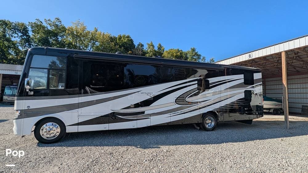 Call now about this 2017 Newmar Canyon Star 3921! 2017 Newmar Canyon Star 3921 - Used Toy Hauler For Sale by Pop RVs in Mooresville, Indiana features Awning, Slideout, Generator, Air Conditioning