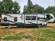 Call now about this 2021 Grand Design Momentum 398M! 2021 Grand Design Momentum 398M - Used Toy Hauler For Sale by Pop RVs in Blacksburg, South Carolina features Generator, Air Conditioning, Slideout, Awning, Leveling Jacks