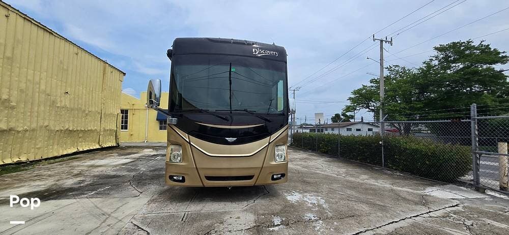 Call now about this 2015 Fleetwood Discovery 40G! 2015 Fleetwood Discovery 40G - Used Diesel Pusher For Sale by Pop RVs in West Palm Beach, Florida features Generator, Awning, Leveling Jacks, Slideout, Air Conditioning