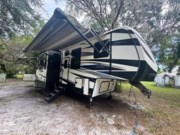 Call now about this 2019 Keystone Fuzion 373! 2019 Keystone Fuzion 373 - Used Toy Hauler For Sale by Pop RVs in Hudson, Florida features Leveling Jacks, Generator, Slideout, Air Conditioning, Awning