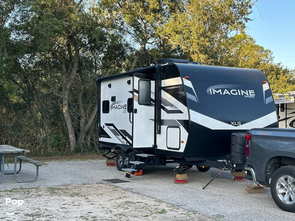 Call now about this 2023 Grand Design Imagine 17MKE! 2023 Grand Design Imagine 17MKE - Used Travel Trailer For Sale by Pop RVs in Litchfield, Connecticut features Leveling Jacks, Awning, Slideout, Air Conditioning