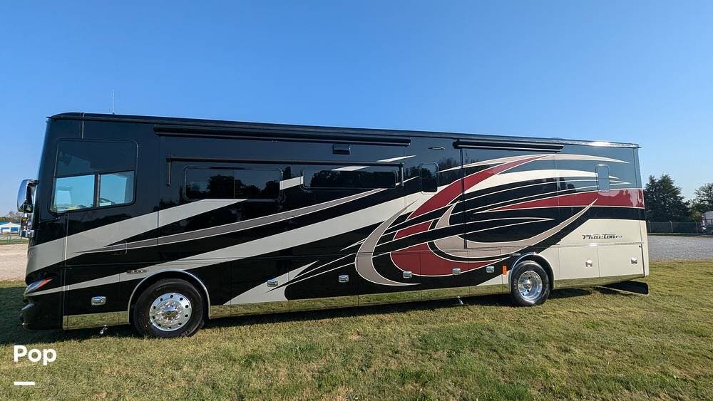 Call now about this 2019 Tiffin Phaeton 40 IH! 2019 Tiffin Phaeton 40 IH - Used Diesel Pusher For Sale by Pop RVs in Hope, Indiana features Slideout, Leveling Jacks, Air Conditioning, Awning, Generator