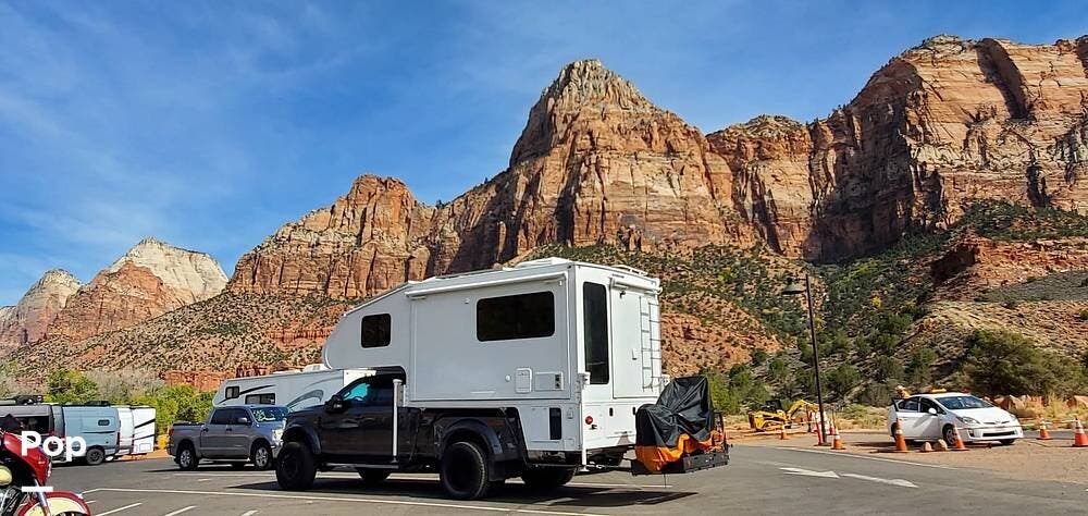 Call now about this 2022 Host Mammoth Host 11.6! 2022 Host Mammoth Host 11.6 - Used Truck Camper For Sale by Pop RVs in Colchester, Vermont features Generator, Awning, Leveling Jacks, Air Conditioning, Slideout