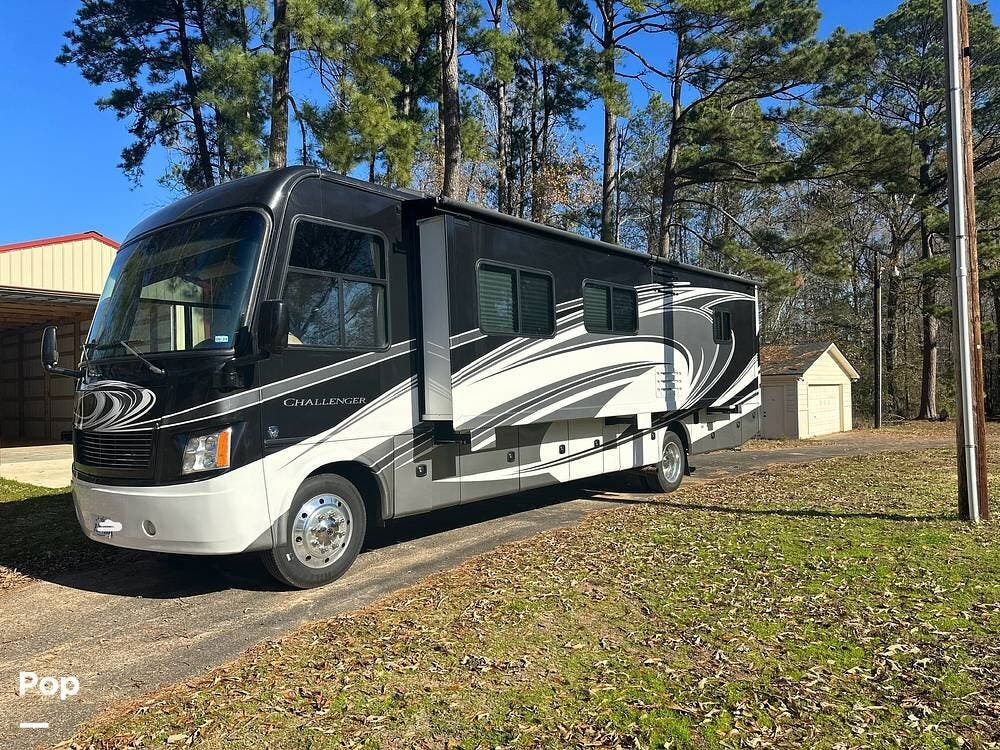 Call now about this 2014 Thor Motor Coach Challenger 36FD! 2014 Thor Motor Coach Challenger 36FD - Used Class A For Sale by Pop RVs in Marshall, Texas features Awning, Slideout, Generator, Air Conditioning, Leveling Jacks
