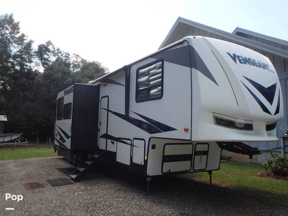 Call now about this 2019 Forest River Vengeance 388V16! 2019 Forest River Vengeance 388V16 - Used Toy Hauler For Sale by Pop RVs in Foley, Alabama features Awning, Slideout, Leveling Jacks, Air Conditioning, Generator